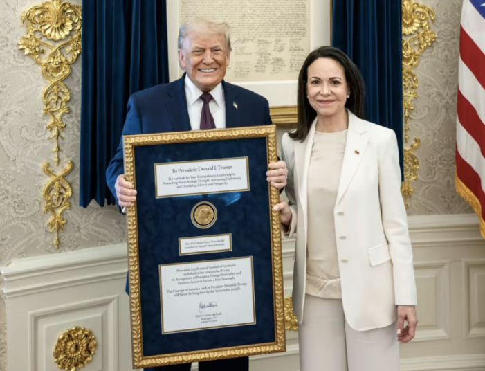 Maria Corina Machado bows down and gifts the Orange King, Donald Trump