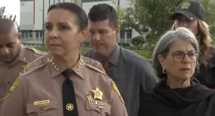 Sheriff Rosie muscles Mayor Daniella out of the way at MIA crash presser